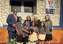 (back row) Joel E. Johnson, Allegheny West Conference (AWC) executive secretary; Paula Olivier, Black Adventist Youth Directors Association president; Elethia Dean, a Bible Bowl coach; Marcia Sackie, a Bible Bowl coach; (front row) and pre-junior team members Jeremy Kargbo, Caleb Cunningham, Chimwemwe Kulemeka and Xahara Chisebe represent the AWC at the 2023 Bible Bowl Championship event. Photo by Tamaria L. Kulemeka